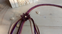 Hawaiian ribbon lei: prachtige lintketting maken